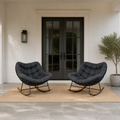 Scale | two rocking chairs beside a full-height exterior doorway for scale