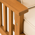 Hardware | close view of the chair's pale gold-toned fastener, acacia grain, vertical slats, and cushion edge