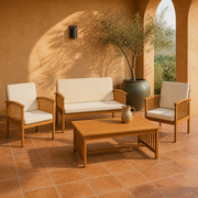 In a room | terracotta loggia view of the complete brown acacia conversation set with cream cushions