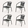 Studio | four black stacking patio armchairs at a three-quarter angle on a clean studio background