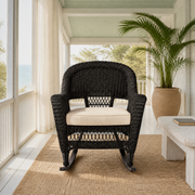 Screened veranda | espresso resin-wicker rocking chair with pale tan seat cushion and potted palm