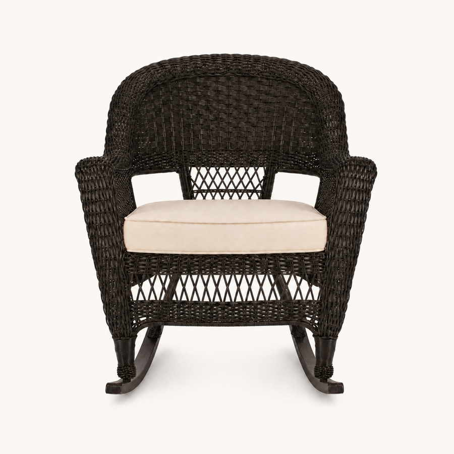 Studio front | espresso resin-wicker rocking chair with pale tan seat cushion and curved rocker runners