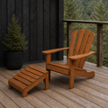 Cabin deck | brown eucalyptus Adirondack chair and separate matching slatted ottoman on a charcoal timber deck