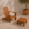 Terracotta courtyard angle | brown eucalyptus Adirondack chair and separate matching slatted ottoman from the opposite side