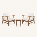 Front | Two warm-brown acacia club chairs with cream cushions and one slatted side table on clean studio ground