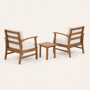 Side | Rear three-quarter view of two acacia club chairs and the side table, showing back rails and table legs