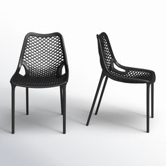 Angle | Three-quarter view of the Wulfern Despotiko Perforated Dining Chairs