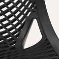 Arm opening close-up | Integrated triangular arm opening, solid perimeter, and Black plastic lattice