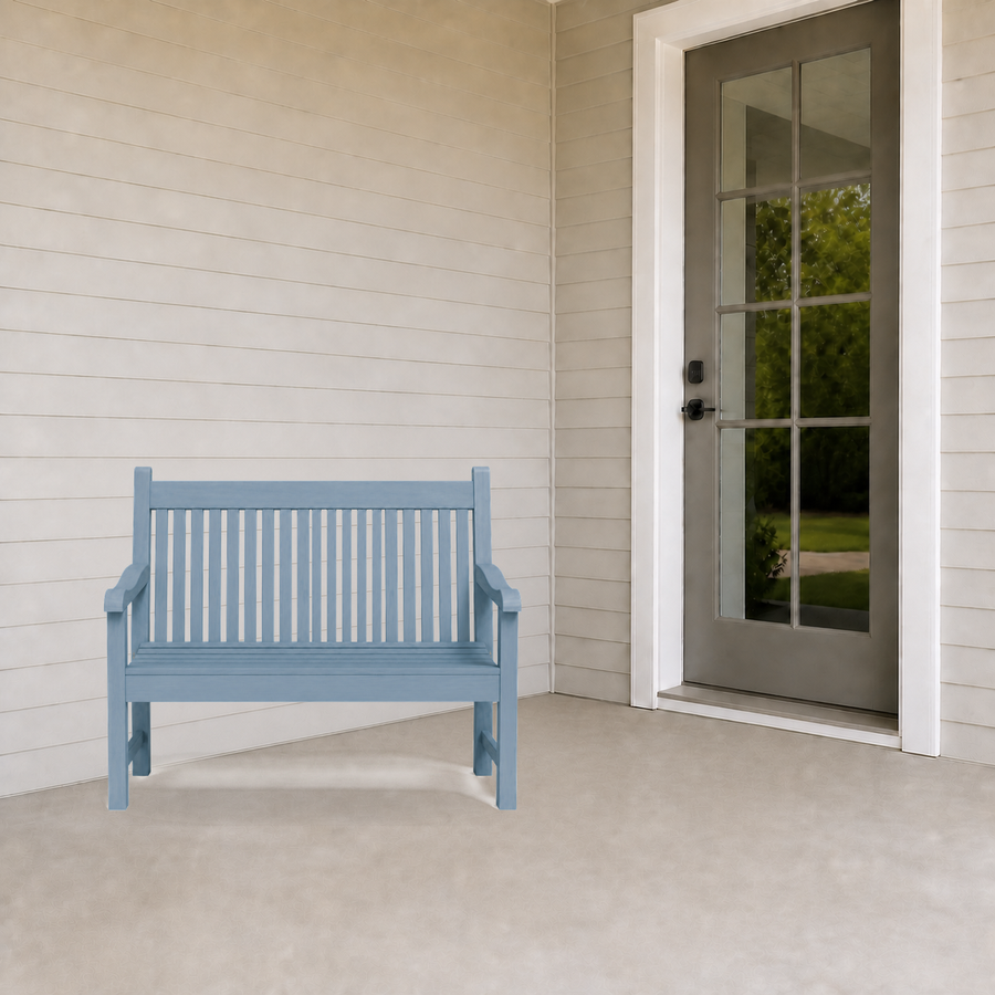 In scale | blue garden bench beside a full-height porch doorway
