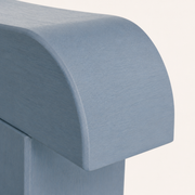 Detail | dusty blue poly lumber grain and rounded shaped arm end
