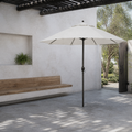 Cool limewash courtyard | open off-white octagonal umbrella beneath a dark pergola with a bench and open garden door