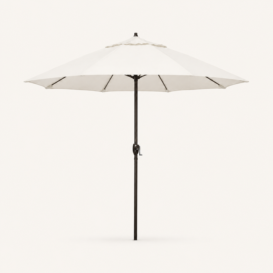 Front | one off-white octagonal umbrella with dark bronze pole, vented crown and crank on a clean studio ground