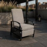Rooftop | upright patio recliner on dark slate pavers in an urban rooftop courtyard