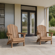 Scale | two Teak folding Adirondack chairs beside an uncropped full-height patio doorway