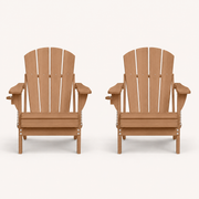 Front | two matching Teak folding HDPE Adirondack chairs on a clean studio ground