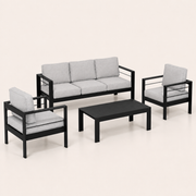 Studio three-quarter | black aluminum sofa, two armchairs, and slatted coffee table from a true angled view
