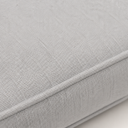 Upholstery detail | light-gray woven olefin cushion fabric and tone-on-tone piped seam