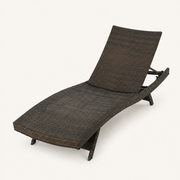 Studio | three-quarter studio view of the curved dark wicker chaise and recline support