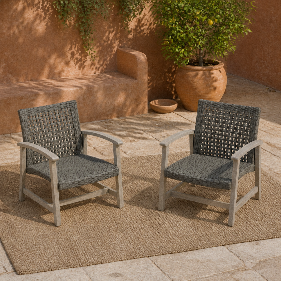 Terracotta courtyard | Two light gray-washed acacia and dark wicker club chairs shown as a pair