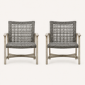Studio front | Two light gray-washed acacia club chairs with dark open wicker seats and tall square backs