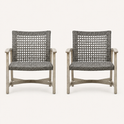 Studio front | Two light gray-washed acacia club chairs with dark open wicker seats and tall square backs