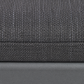 Cushion texture | Close view of dark gray woven cushion fabric, stitched edge and matte gray rail