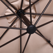 Hardware | close view of dark canopy hub and radial ribs beneath Sand umbrella