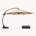 Front | front studio view of Sand offset cantilever umbrella with dark curved arm, mast foot, and separate wheeled base