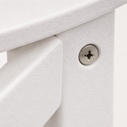 Hardware | close-up of a round stainless Phillips screw at a white HDPE chair arm joint