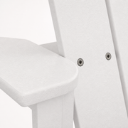 Texture | close-up of white pebbled HDPE chair surface, rounded arm edge, and stainless screws
