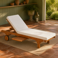 Garden veranda | eucalyptus chaise with raised cream cushion, disc wheels, and extended slatted tray