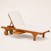 Three-quarter studio view | cream-cushioned eucalyptus chaise with disc wheels and slatted pull-out tray