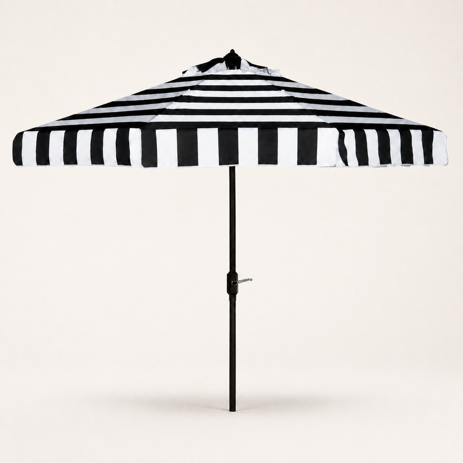 Front | front studio view of the open black and white striped octagonal umbrella with dark pole
