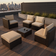 In a room | city rooftop with six-piece dark brown wicker conversation set and beige cushions