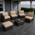 In a room | coastal veranda with six-piece dark brown wicker conversation set and beige cushions