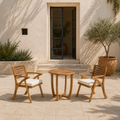 Scale | the complete acacia bistro set in front of a full-height courtyard doorway