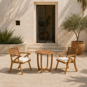 Scale | the complete acacia bistro set in front of a full-height courtyard doorway