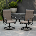 Cool bluestone courtyard | two brown sling swivel dining armchairs beside a concrete planter and clipped boxwood
