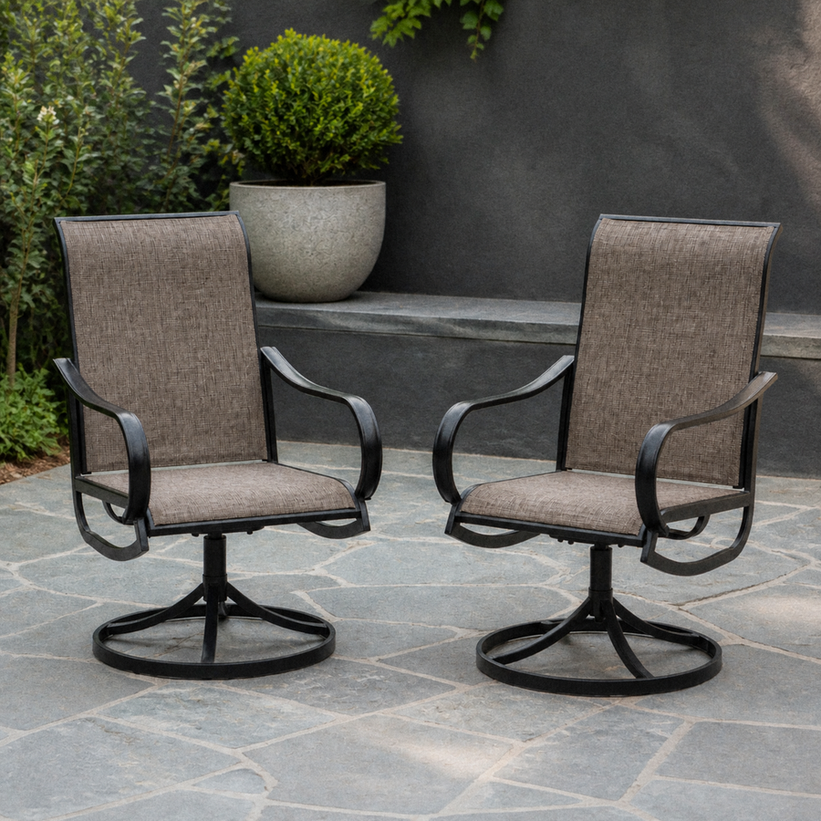 Cool bluestone courtyard | two brown sling swivel dining armchairs beside a concrete planter and clipped boxwood
