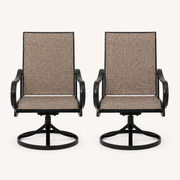 Studio front | two brown sling swivel dining armchairs with black curved arms and round bases on a clean background