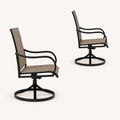 Studio side | two brown sling swivel dining armchairs in true side profile showing seat depth and curved arms