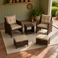 Garden veranda | complete set on a cream rug against sage beadboard and terracotta tile