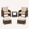 Front studio view | two brown wicker chairs, two beige-cushioned ottomans, and square glass-top table