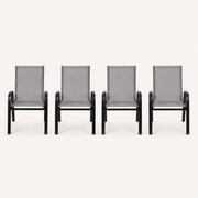 Front | four Gray stacking armchairs aligned in a clean front studio view, showing gray sling seats and black frames
