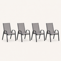 Side | four Gray stacking armchairs from a side studio angle, showing the curved arm profile and rear legs