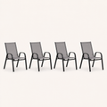 Studio | four Gray stacking armchairs in a clean three-quarter studio view, showing curved black arms and gray sling backs