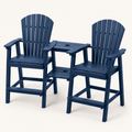 Three-quarter | Two navy blue bar-height Adirondack chairs with both tray tiers, slatted backs, arms and footrests visible