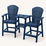 Three-quarter | Two navy blue bar-height Adirondack chairs with both tray tiers, slatted backs, arms and footrests visible