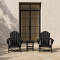 Scale | two black Adirondack chairs and black square side table beside a full-height black-framed patio door