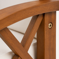 Joinery detail | acacia X-brace join with brass-toned recessed fastener